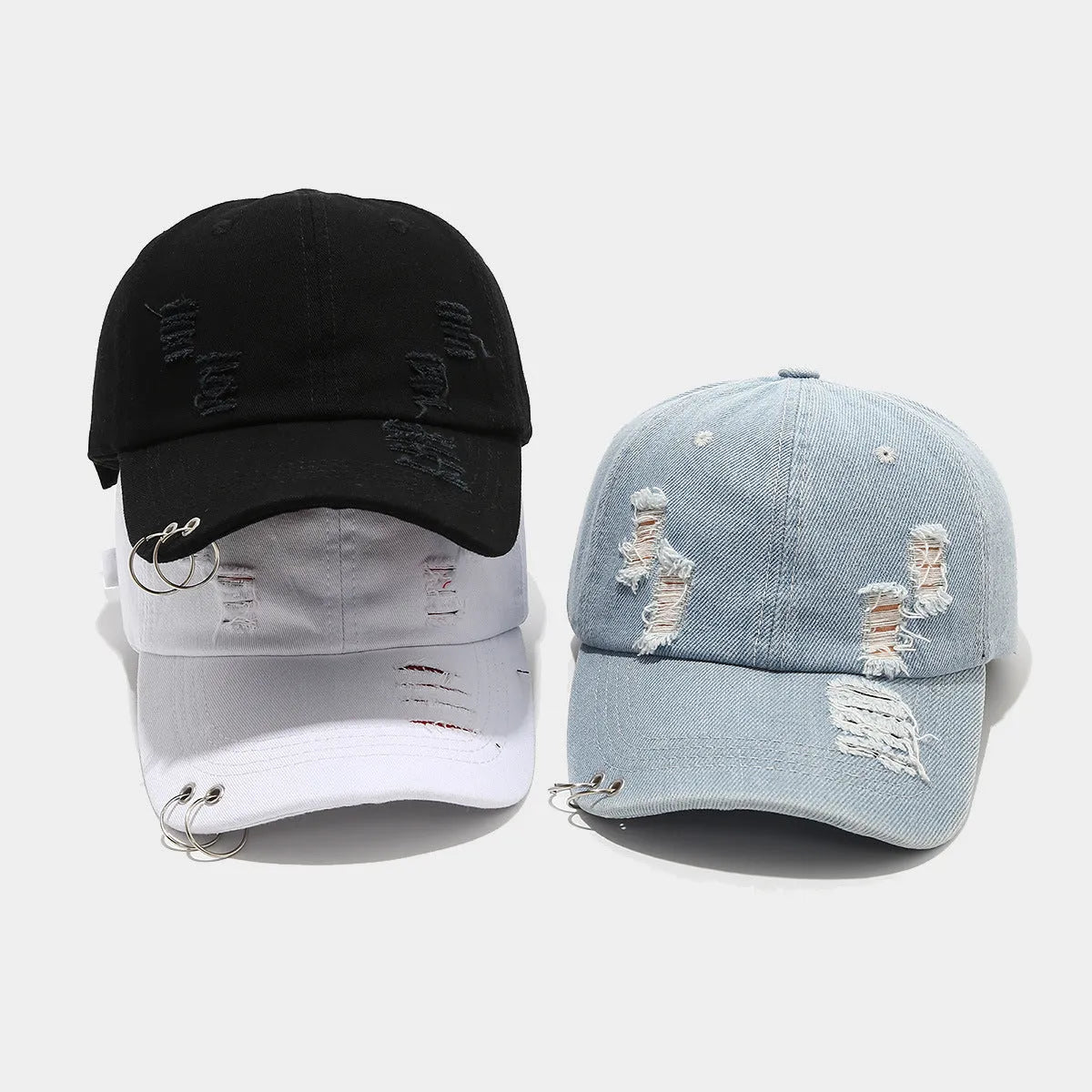 Men's adjustable denim peaked cap with dome crown in light blue jeans colour on a plain background