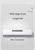 White automatic household vacuum sealer machine on a kitchen countertop.