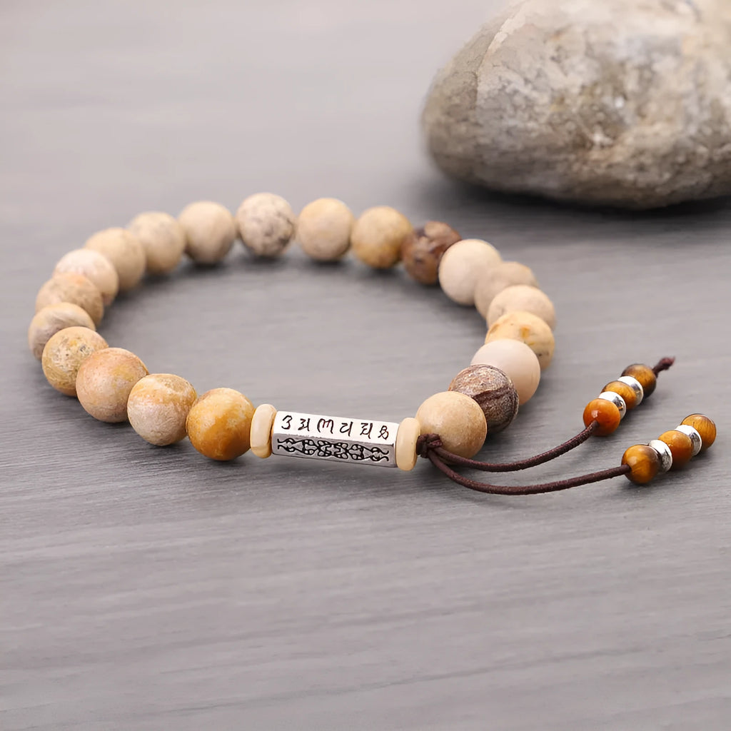 Wood colour stone bead bracelet with handmade construction on wrist