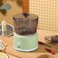 Mini meat grinder in white with 225ml capacity, stainless steel blade, and anti-slip pad