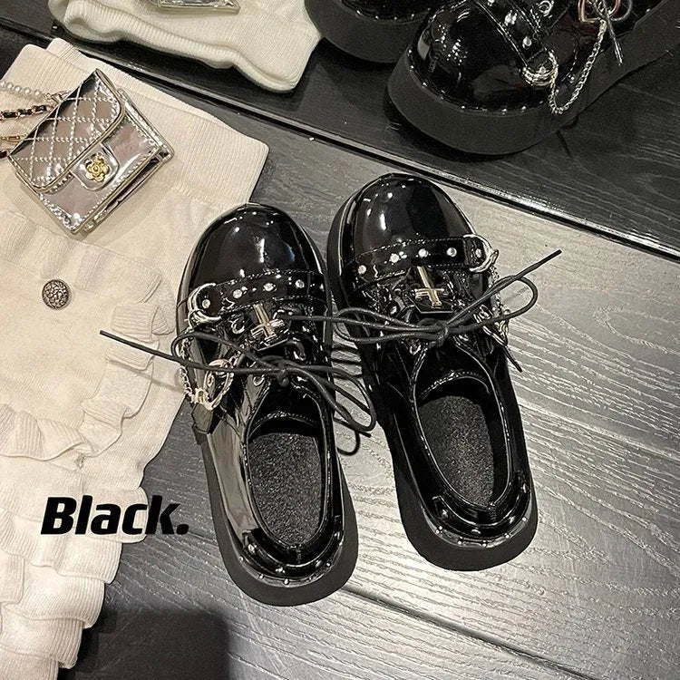 Black punk platform leather shoes with rubber sole and decorative stitching in dark lolita style