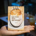 A5 size 2025 mini desk calendar open to a page showing a date and motivational quote.
