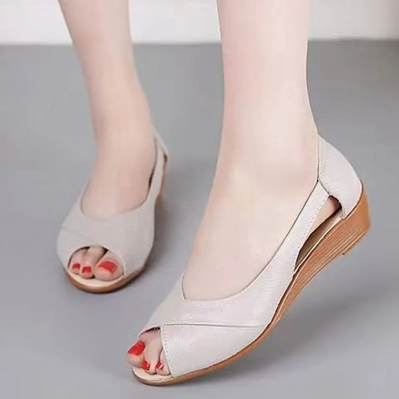 Women's peep toe rubber mid heel sandals with ankle buckle in black, side view