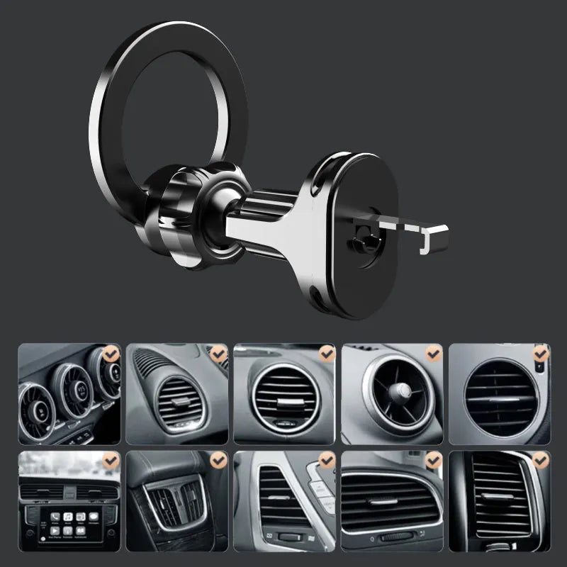 Black magnetic car phone holder clipped to a car air vent with a smartphone attached.