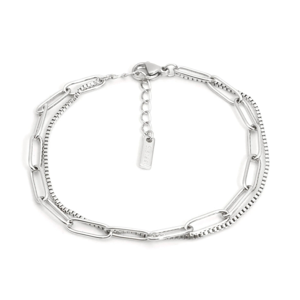 Double layer geometric stainless steel bracelet with linear elements in gold or silver electroplated finish