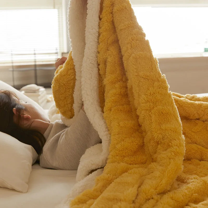 Polyester winter thermal blanket in beige colour, sized 180x200 cm, on a bed.