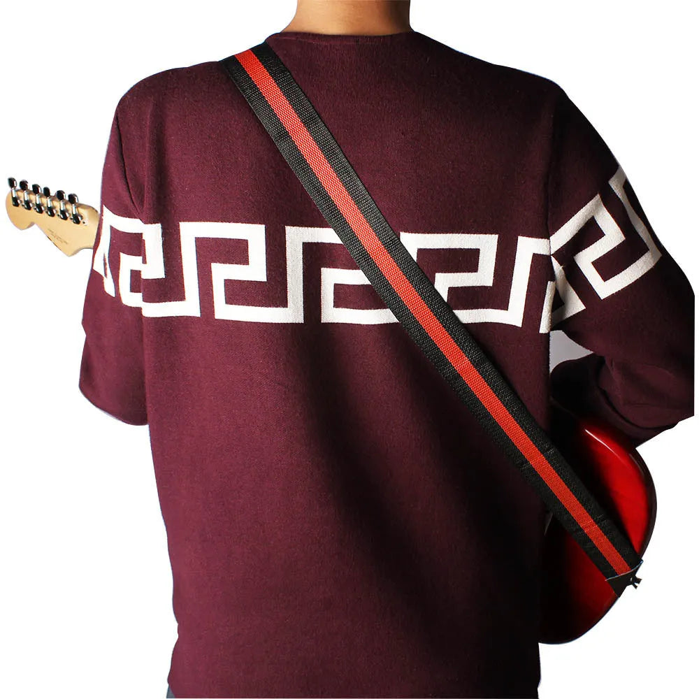 Woven crossbody strap for guitars, bass, and ukuleles in five colour options