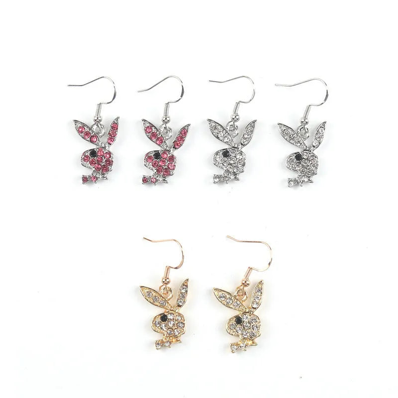 Rabbit stud earrings with diamond sparkle in silver, pink, and gold colours.