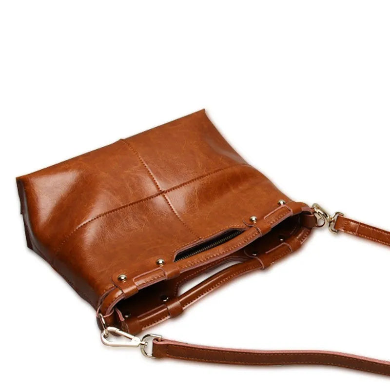 European and American retro solid colour women's leather messenger bag in genuine first layer cowhide, black colour