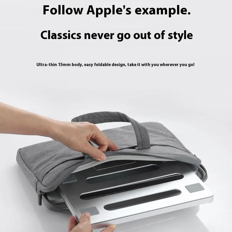 Super light aluminium alloy folding notebook cooling rack with cooling function, open on a desk showing slim profile