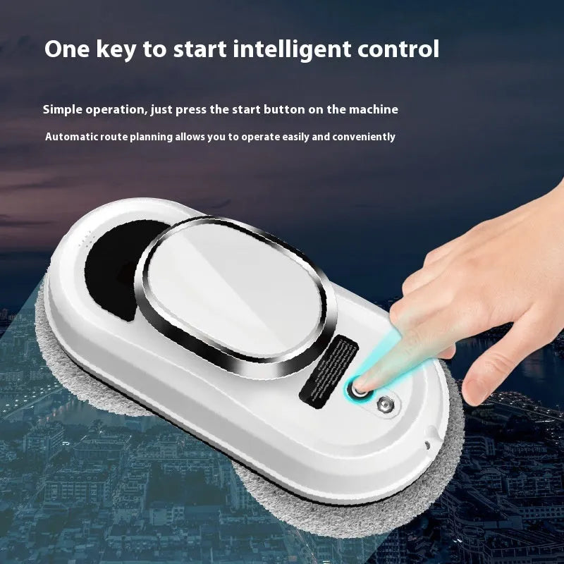 White automatic window cleaning machine with remote control and cleaning accessories on a windowsill