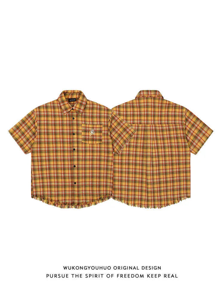 Yellow grid plaid short sleeve shirt with embroidered pocket detail in loose fit