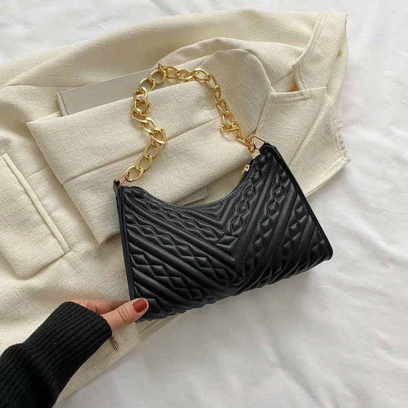 Brown pleated PU leather vertical square shoulder bag with a chain strap and soft handle.