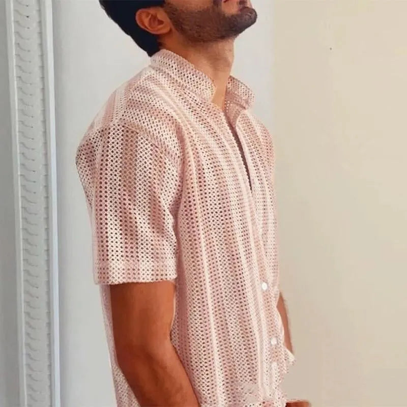 Men's pink loose-fit waffle-textured short-sleeve cardigan shirt on a hanger.