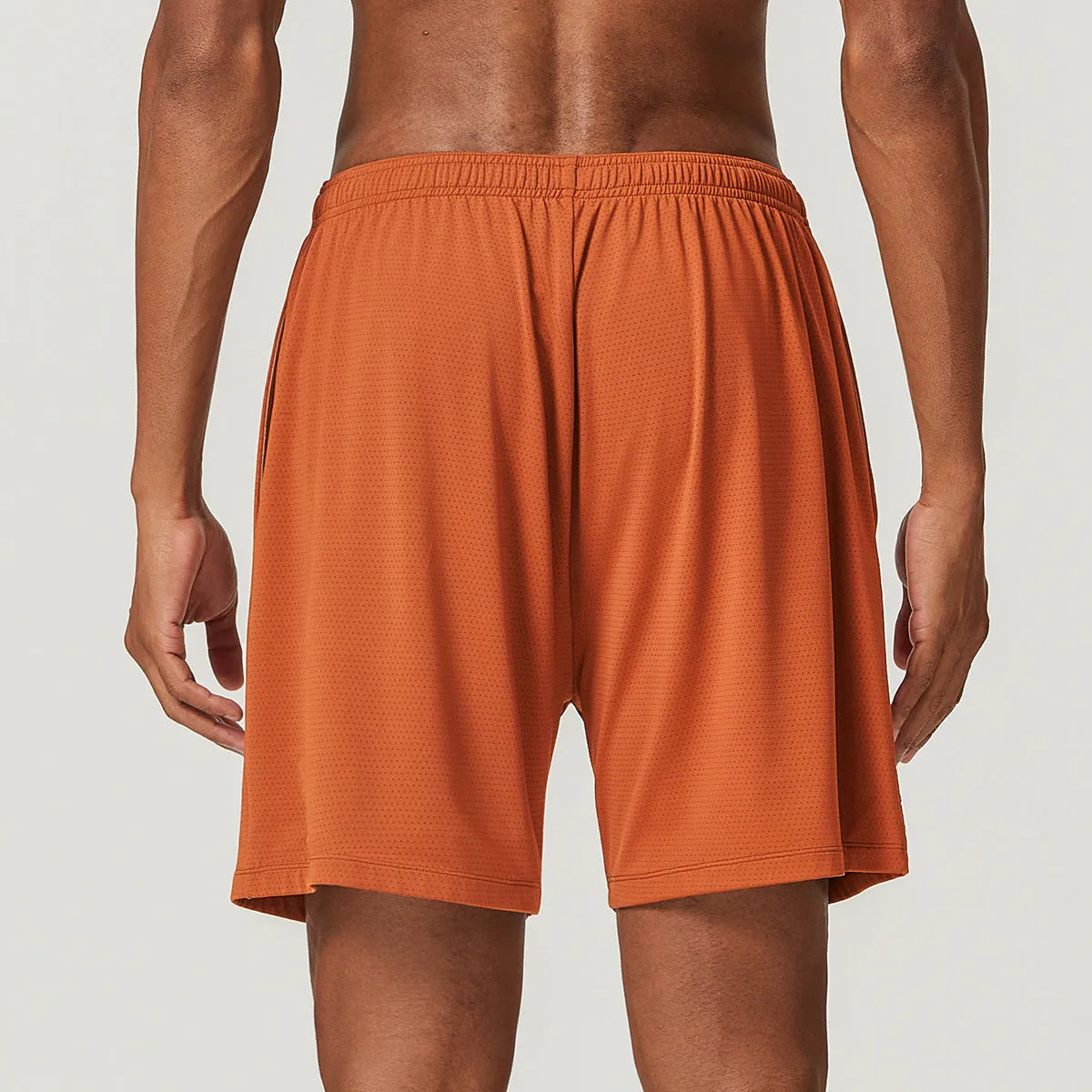 Men's double-layer quick-dry running shorts in various colours with mid-waist design