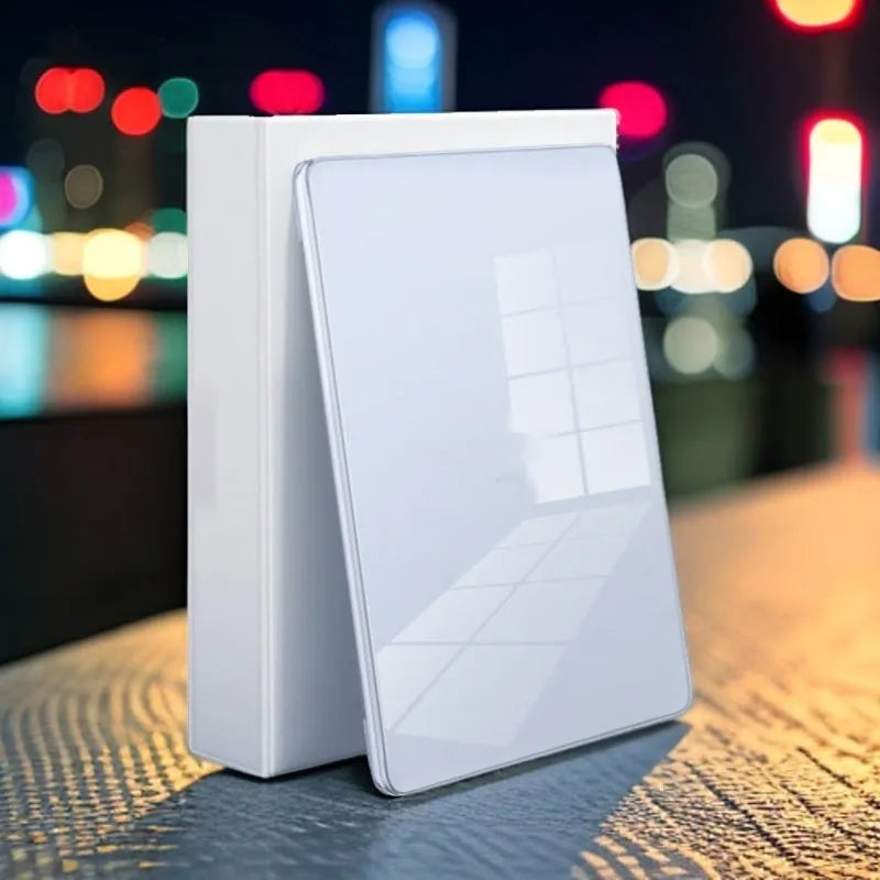 Clear plastic protective case for MacBook Air and MacBook Pro laptops on a table.