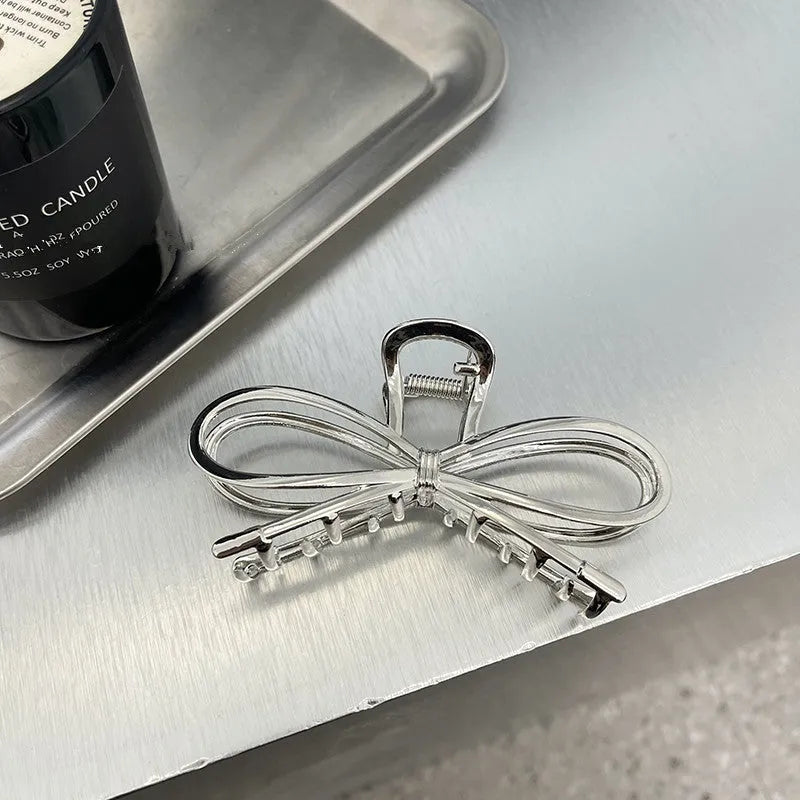Woman's bow barrette hair clip with alloy finish in silver colour, manual craft Korean style