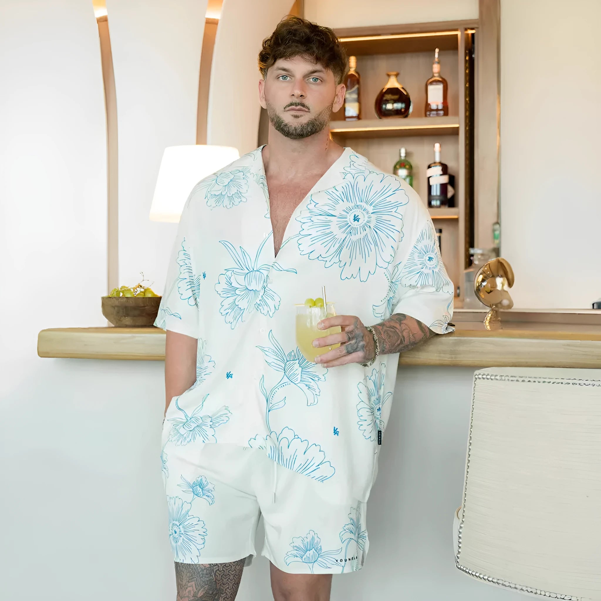 Men's floral printed loose short sleeve top in light colours with cardigan style