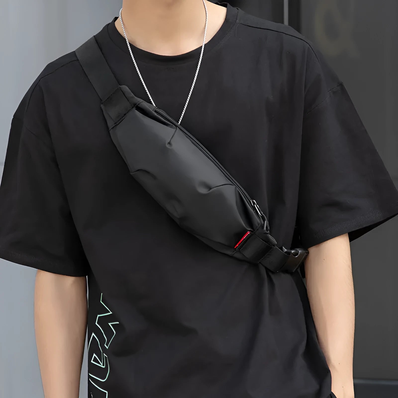 Black Oxford cloth crossbody waist pack showing multiple internal pockets and zipper closure