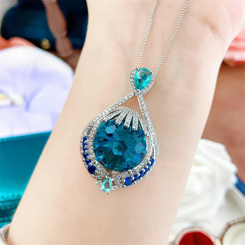 Geometric blue crystal pendant necklace with water wave chain for women