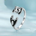 Adjustable panda sterling silver ring with white gold plating and open bracelet design
