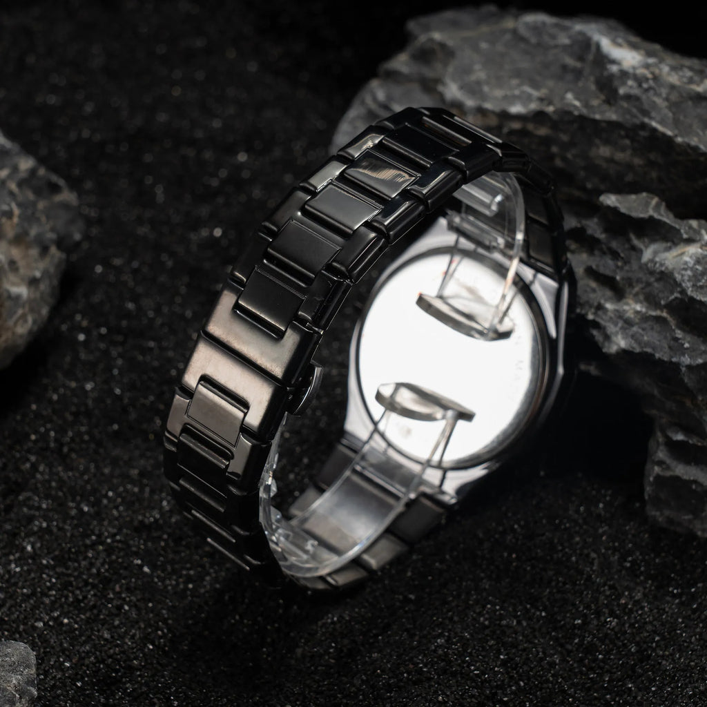 Men's silver black business watch with stainless steel belt and quartz dial.