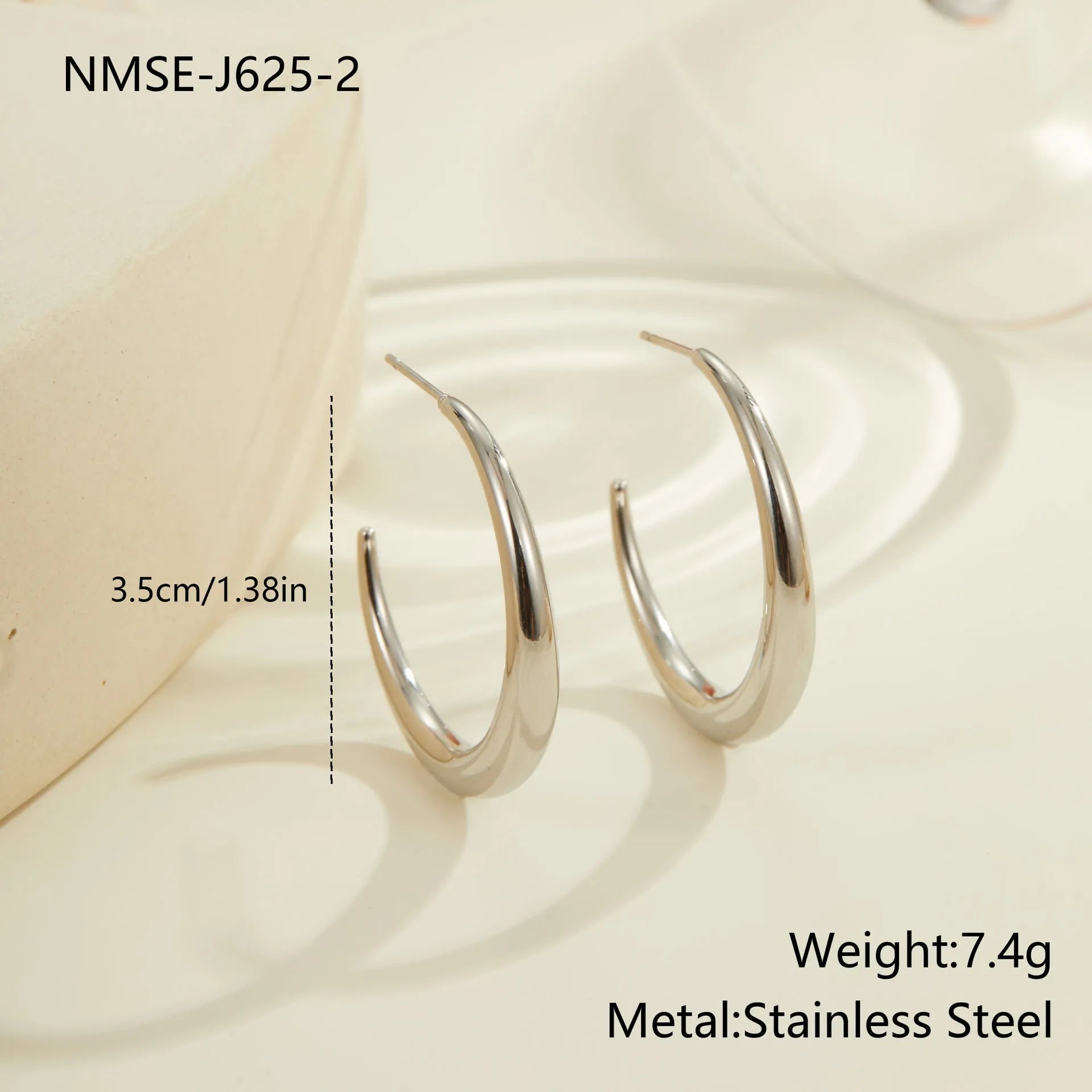 Geometric round titanium steel hoop earrings with 18K gold plating in large and small sizes