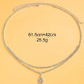 Gold or silver waist chain with water drop pendant and tassel detail, showing lobster clasp closure.