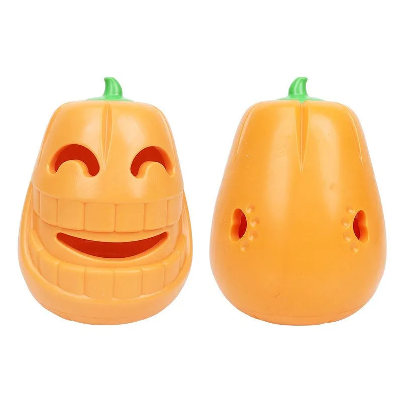Orange Halloween pumpkin shaped dog chew toy with a funnel opening for treats.