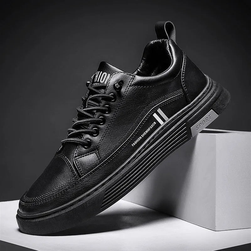 Men's black and white low-top skate shoes with elastic band and rubber soles