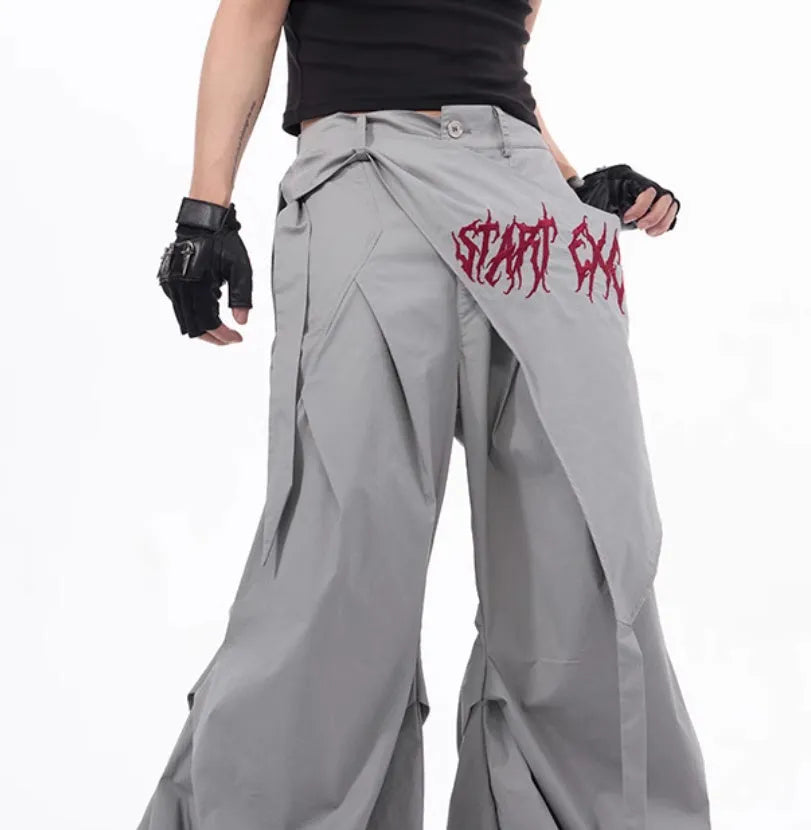 Korean-style black wide-leg summer function pants for boys displayed flat