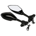 Motorcycle rear view mirror with LED arrow light in carbon grain finish on a Japanese street car