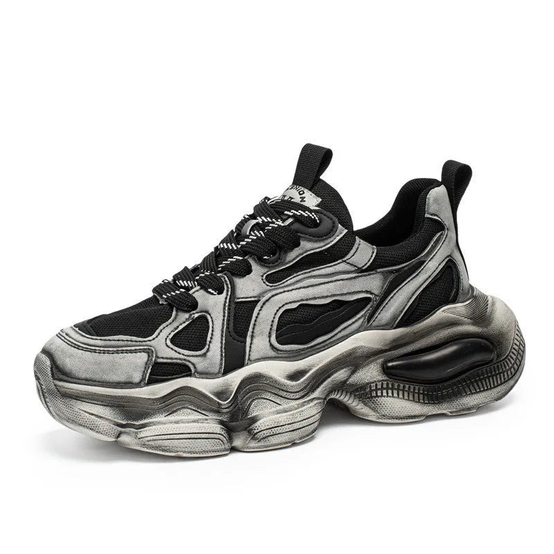 Men's black mesh height increasing sneaker with platform sole and lace-up front.