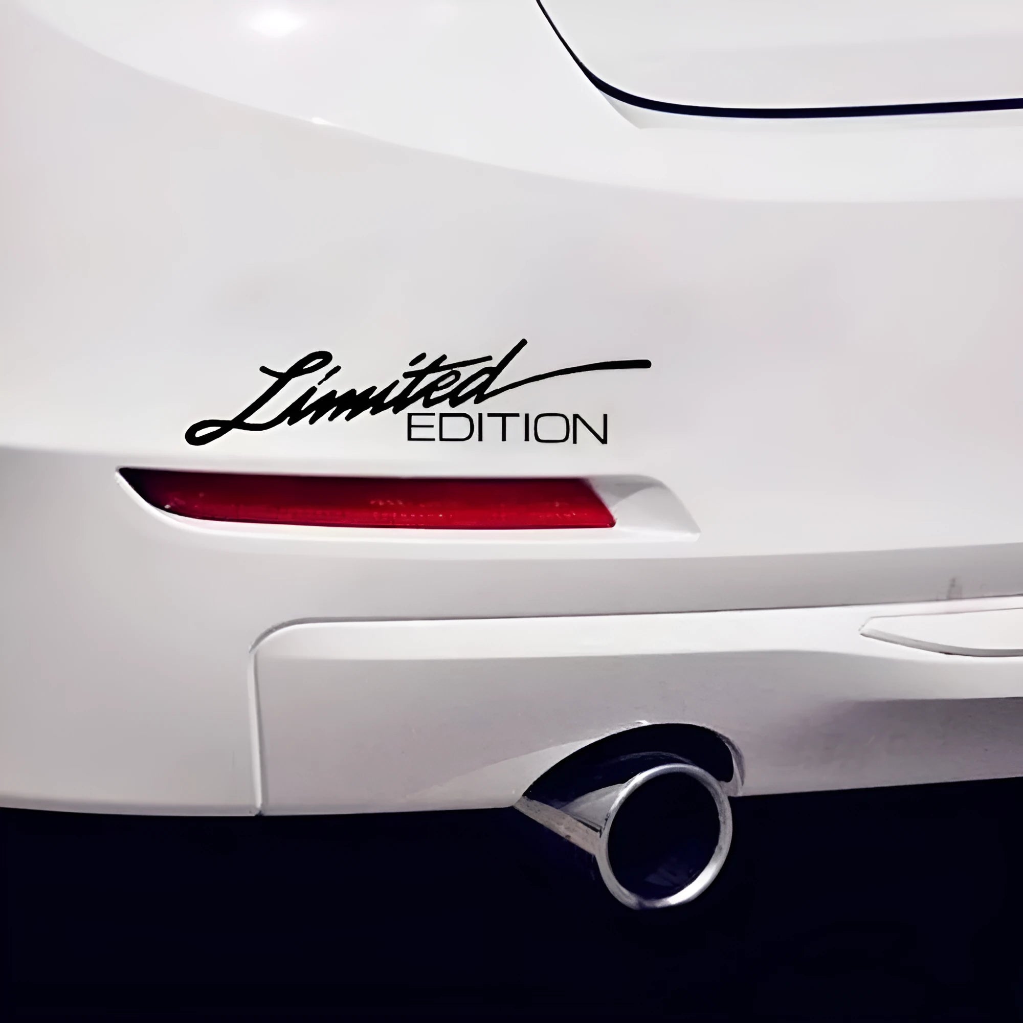 Reflective plastic bumper sticker with British design, measuring 16cm by 3.8cm.