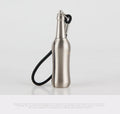 Creative metal keychain lighter with flint strike, bottle opener, and key ring in black nickel finish