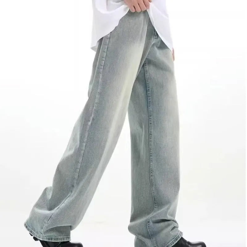 Blue retro-style loose casual trousers made of rabbit fur fabric on a hanger.