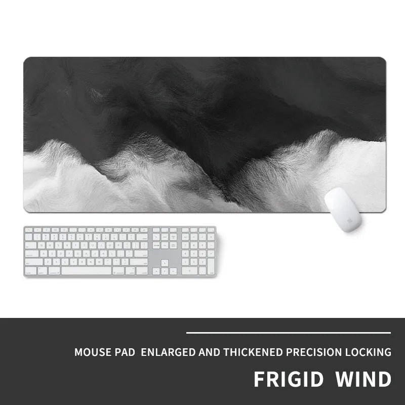 Oversized natural rubber gaming mouse pad with thermal transfer printed artwork on desk with keyboard