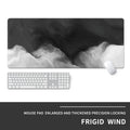 Oversized natural rubber gaming mouse pad with thermal transfer printed artwork on desk with keyboard
