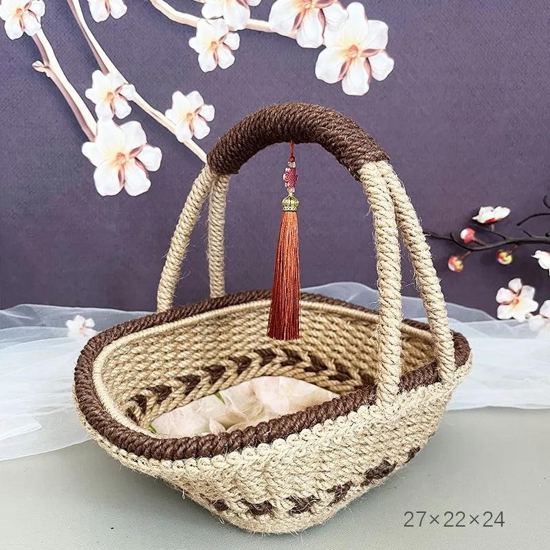 Hand-woven rustic straw basket in coffee brown colour, measuring 19cm by 12cm.