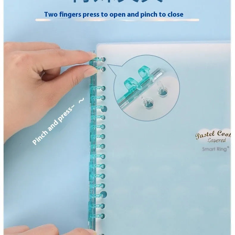 Refillable loose-leaf notebook in pastel blue with transparent PP cover and B5 size