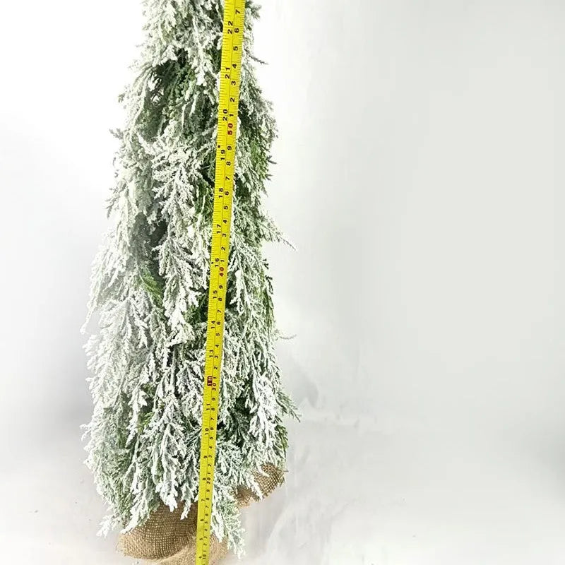 Small 24-inch plastic Christmas tree with PE snow sprayer effects and integrated lighting