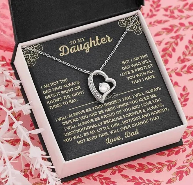 Hollow heart pendant necklace with adjustable chain in gold or silver colour on gift box