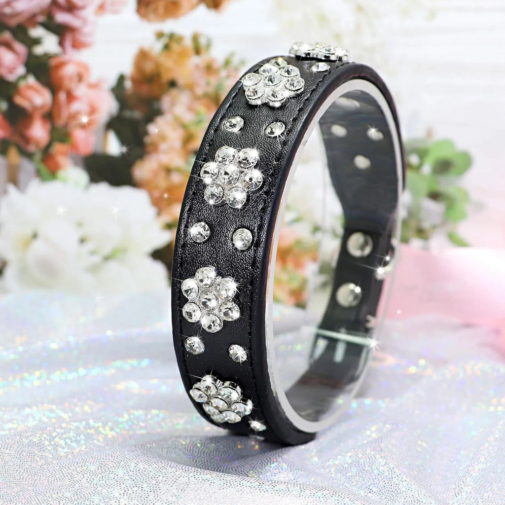 Cute PU leather dog collar with rhinestone flower pattern studs and metal D-ring in black, blue, pink, or red.