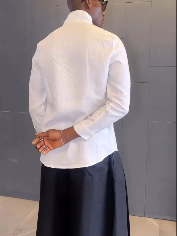 White asymmetric long sleeve shirt and black pleated pants set on model, regular fit, casual daily wear