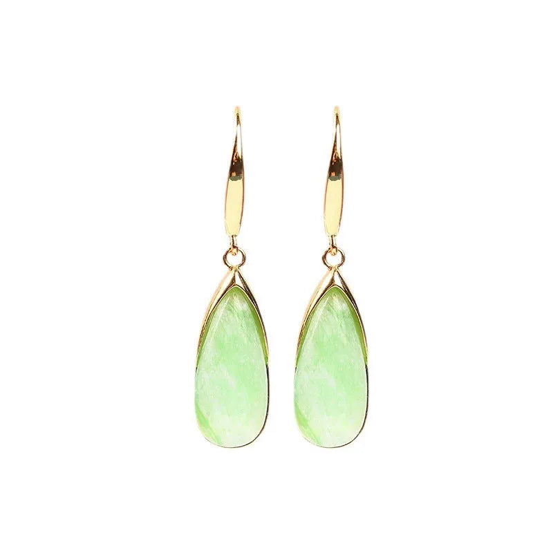 A pair of retro-style geometric water droplet earrings in jade green, made from electroplated copper.