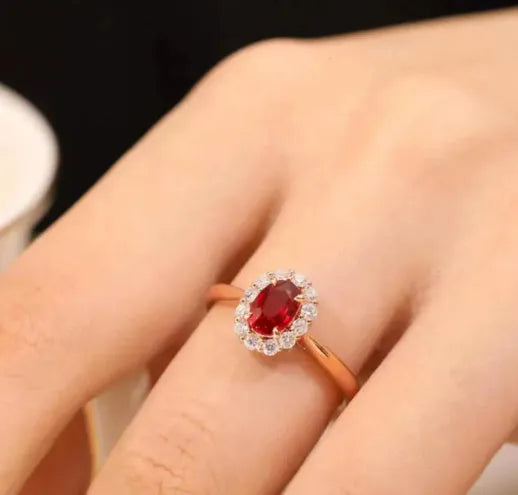Gold Pigeon red blood gemstone sterling silver inlaid ring with floral pattern on silver-plated metal background
