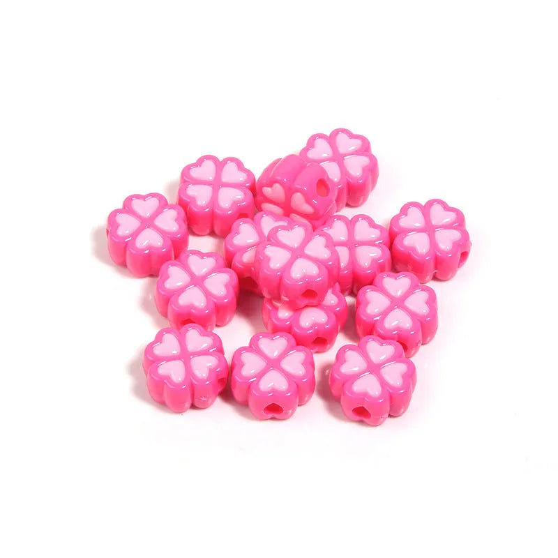 Assortment of 15mm frosted acrylic four-leaf clover beads in pink, yellow, green, blue, purple, and rose red.