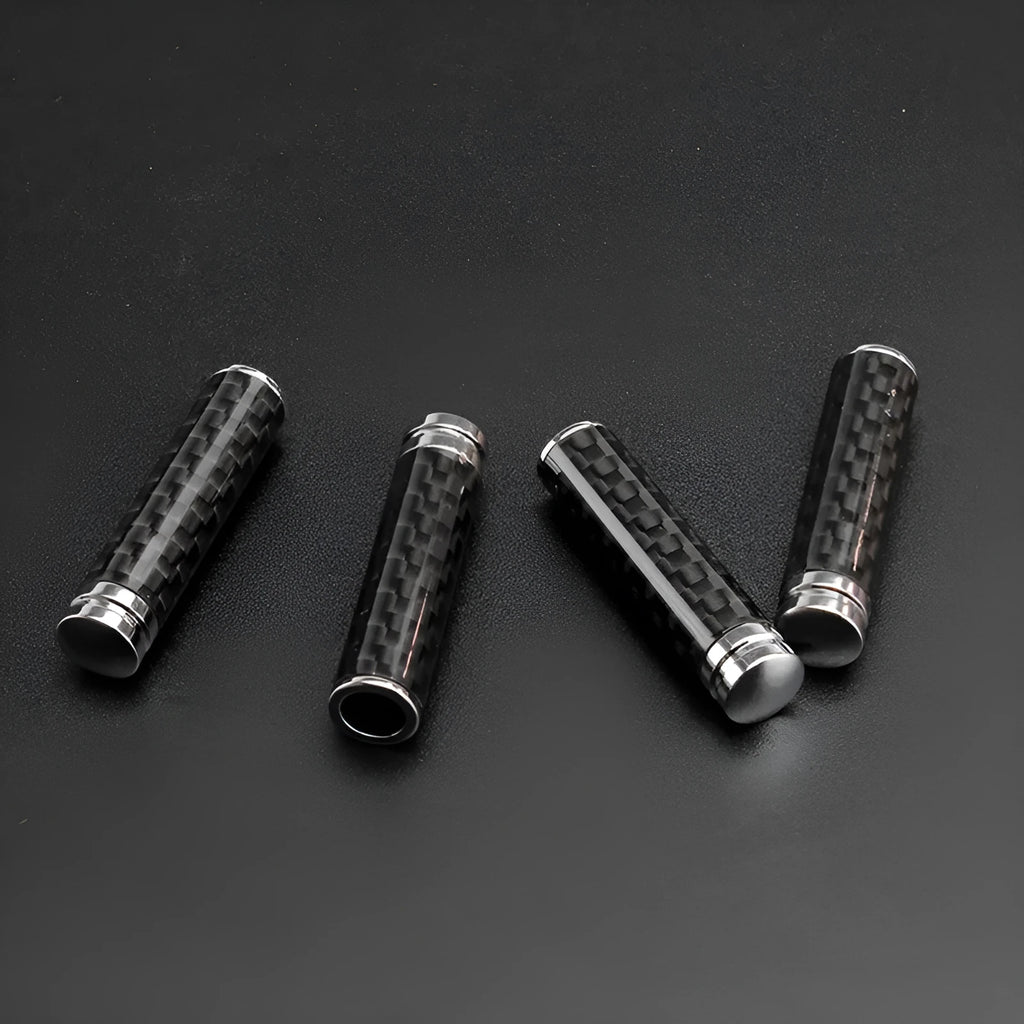 Set of four carbon fibre and metal car door handle decorative replacement covers.