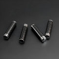Set of four carbon fibre and metal car door handle decorative replacement covers.