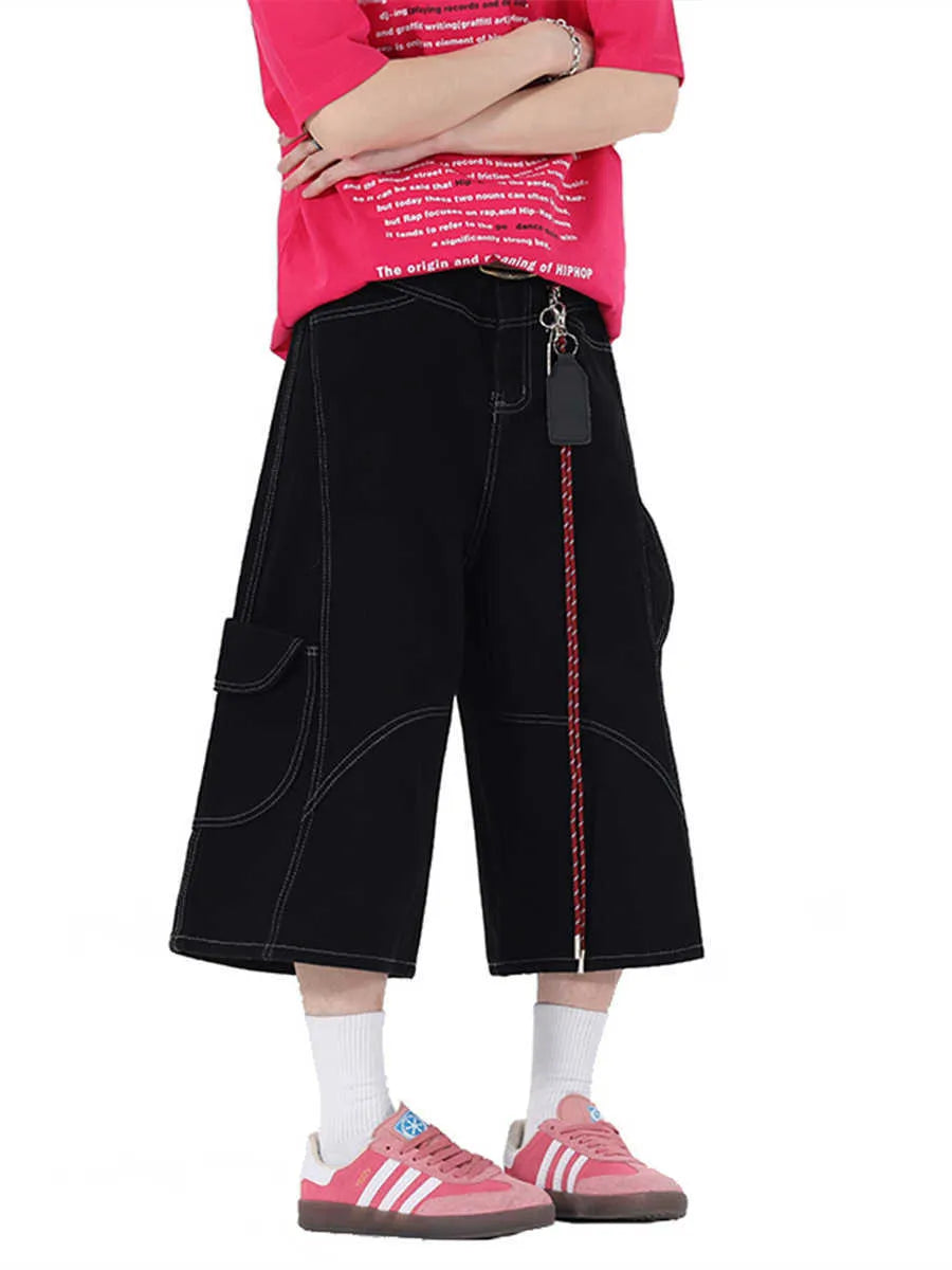 Retro denim workwear shorts with multiple pockets and wide leg design in black colour